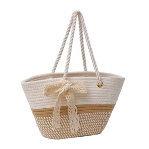 Chic woven tote bag with beige color-blocking and lace bow detail for summer
