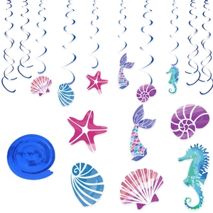 Mermaid party decorations with blue foil spirals and colorful ocean themed cutouts