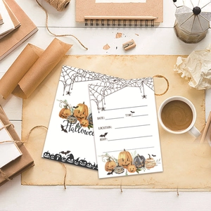 Detailed Halloween party invitation card with pumpkin motifs on a white wooden desk