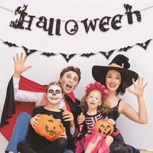 Glittery black Halloween banner with bat garlands for haunted house party atmosphere