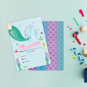 Mermaid party invitations with fish tail design and envelopes for children's birthdays