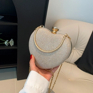 Champagne heart-shaped rhinestone evening clutch with gold ring handle and chain strap