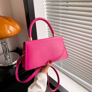 Elegante borsa a mano trapezoidale rosa con manico rotondo e tracolla rimovibile