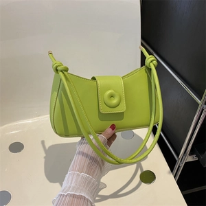 Minimalist light green half-moon hobo bag in soft leather with knot handle detail