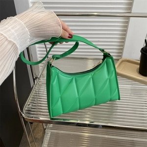 Minimalist green quilted shoulder bag for women with classic rhombus stitching
