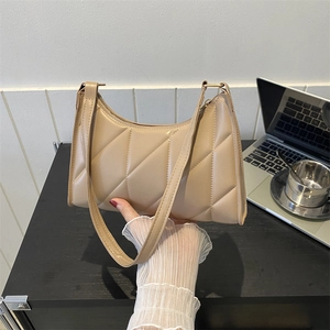 Chic beige quilted shoulder bag with geometric stitching and slim strap for women