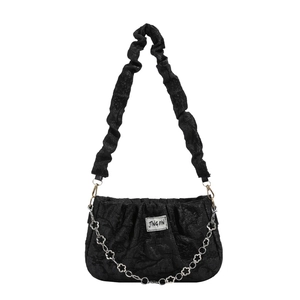 Fashionable black ruched underarm bag with silver flower chain and textured fabric