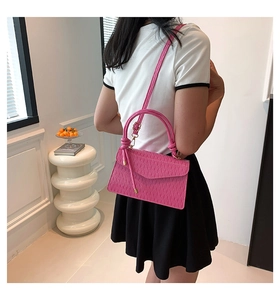 Rose pink crossbody square bag with pleated texture and golden hardware details