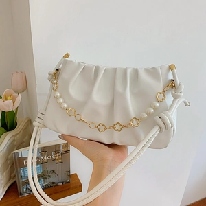 Elegant cream pleated cloud shoulder bag with pearl flower chain and knotted strap details