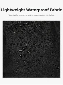 Detail of black high-density travel bag featuring lightweight waterproof fabric texture