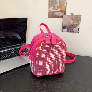 Hot pink mini backpack for women with sparkling silver rhinestones and adjustable straps