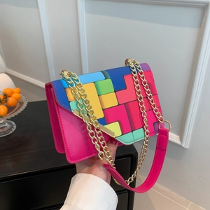 Fashionable color-block chain crossbody bag with colorful geometric patterns and gold strap