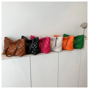 Collection of quilted large capacity tote bags in six colors with chain straps
