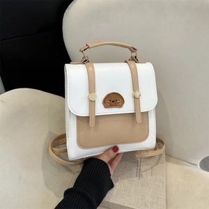 Chic two-tone beige backpack with cute puppy embroidery and premium metal buckles