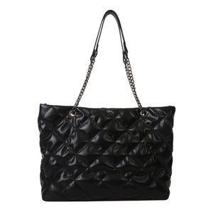 Large black quilted puffer tote bag with silver chain shoulder strap for women