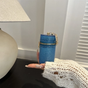 Mini blue glitter cylinder crossbody bag with golden chain and zipper for women