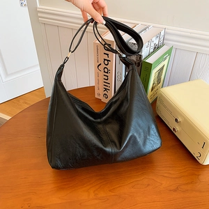 Large black hobo shoulder bag with litchi texture and adjustable strap for daily commute