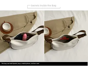 Detail view showing large interior capacity of the cream crescent bag with daily essentials