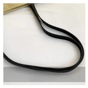 Close-up of black leather shoulder strap with durable double stitching detail