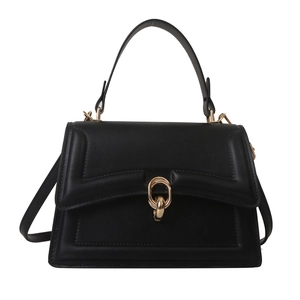 Classic black leather handbag with golden metal buckle and adjustable shoulder strap