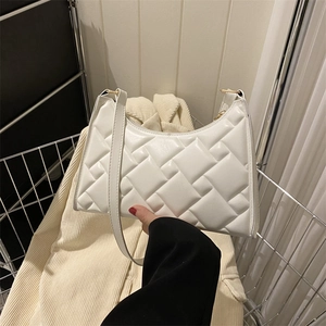 Minimalist white quilted shoulder bag with chic textured pattern for women's style
