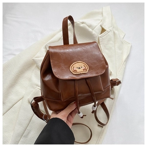 Brown PU leather mini backpack featuring cute cartoon dog embroidery and magnetic flap