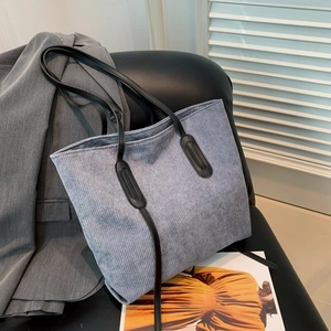 Large capacity corduroy tote bag in light blue-grey with black handles for daily use