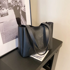Vintage black tote bag with butterfly stitching design and long handles for women