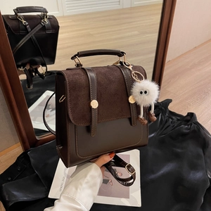Vintage dark brown colorblock satchel with suede flap and cute monster keychain