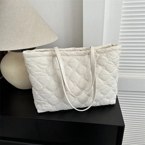 White quilted large capacity tote bag for women with diamond stitching and minimalist style