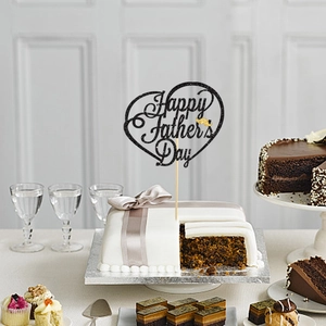 Glittery Happy Father's Day cake topper with golden mustache on festive dessert table