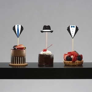 Father's Day glitter cake toppers with suit tie and hat designs on desserts