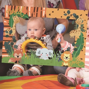 Close-up of Wild One jungle safari animal photo frame prop for first birthday party