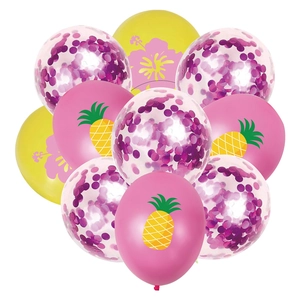 Detail of Hawaii themed balloons with pineapple and hibiscus patterns for party decor