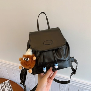 Vintage black faux leather drawstring backpack with fashion stamp and plush pendant
