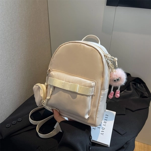 Mini cream bow backpack with plush monster charm and round coin purse for women