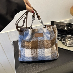 Retro plaid wool tote bag with blue check pattern and leather chain straps for winter