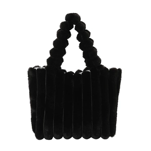Chic black faux fur tote bag with vertical stripes and plush ball handle for autumn and winter