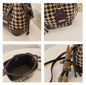 Detailed views of houndstooth bucket bag with leather trim and cute rabbit charm