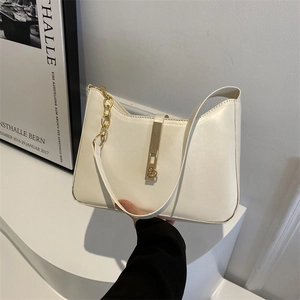 Minimalist creamy white underarm bag with gold metal buckle and leather chain strap