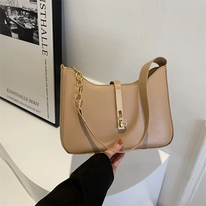 Deep apricot minimalist hobo shoulder bag with golden metallic clasp and chain strap