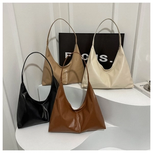 Collection of four matte leather crescent shoulder bags in black, khaki, beige and caramel