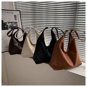 Detailed view of minimalist large capacity PU leather tote bags in four neutral colors
