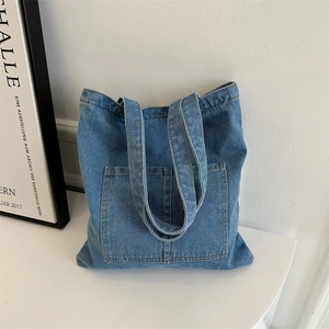 Large capacity washed blue denim tote bag with front pocket and double shoulder straps