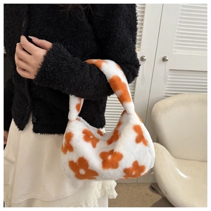 Borsa a mano invernale in peluche bianca con motivi floreali arancioni vivaci