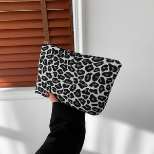 Fashionable leopard print jacquard clutch bag with a high-quality gold metal zipper