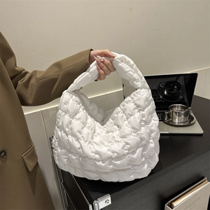 White quilted bubble puff handbag in crescent hobo style for casual daily wear