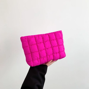 Fashionable rose red quilted hand bag with puffy square design and stylish nylon finish