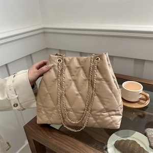 Quilted tote bag with gold chain strap in beige PU leather for women's daily commute