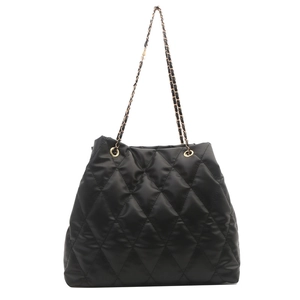 Classic black quilted tote bag with large diamond stitching and metal chain straps